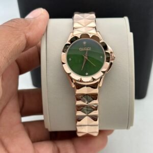 Gucci women's watch featuring an elegant luxury-inspired design, stylish dial, reliable quartz movement, and sophisticated feminine styling suitable for everyday and occasion wear.