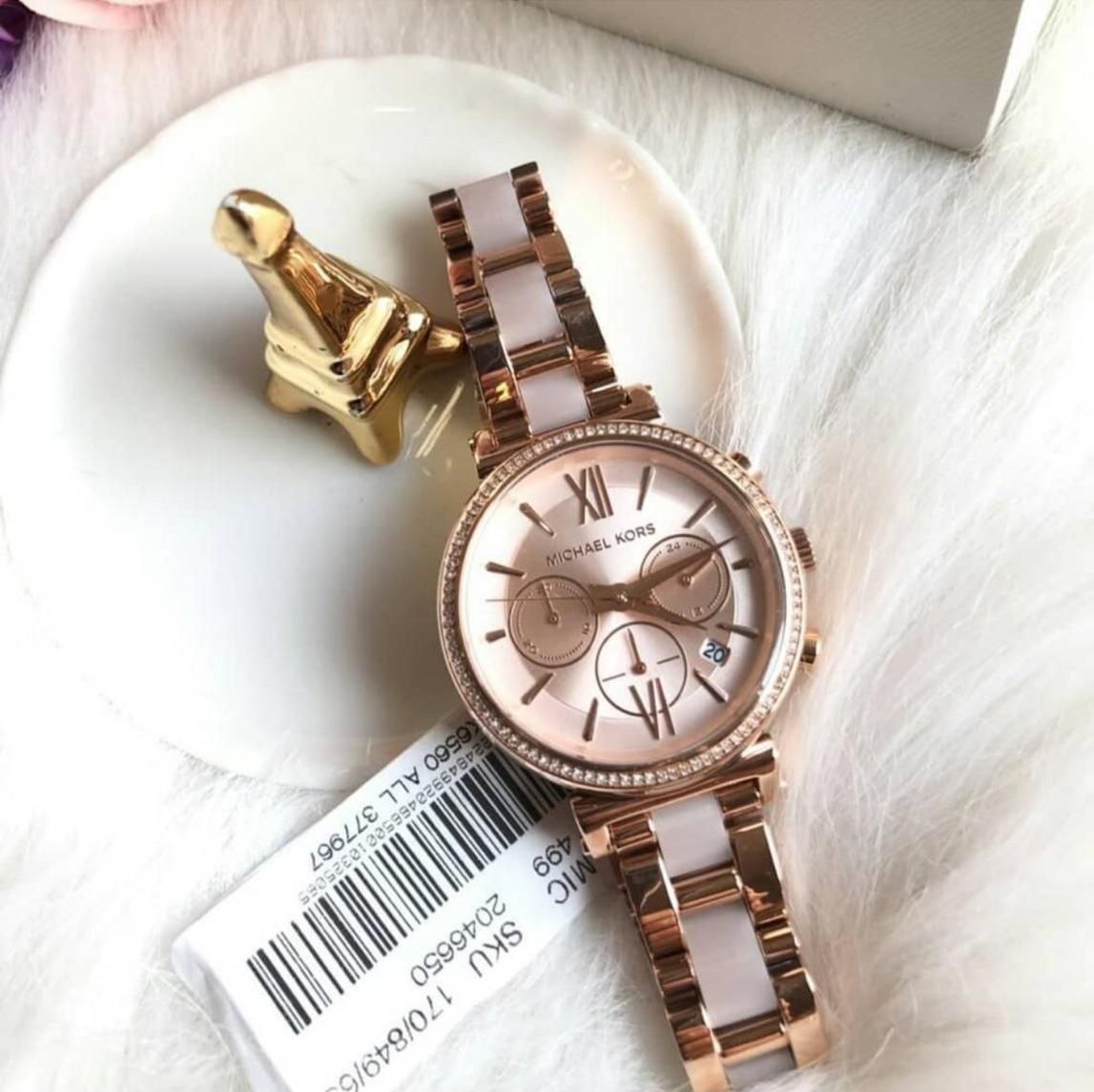 Michael Kors Sofie Women's Watch – Rose Gold Crystal-Studded Bracelet with Date Display & Quartz Movement Michael Kors Sofie Women's Watch featuring an all rose gold stainless steel bracelet, crystal-studded bezel, date display, quartz movement, and elegant luxury-inspired styling.