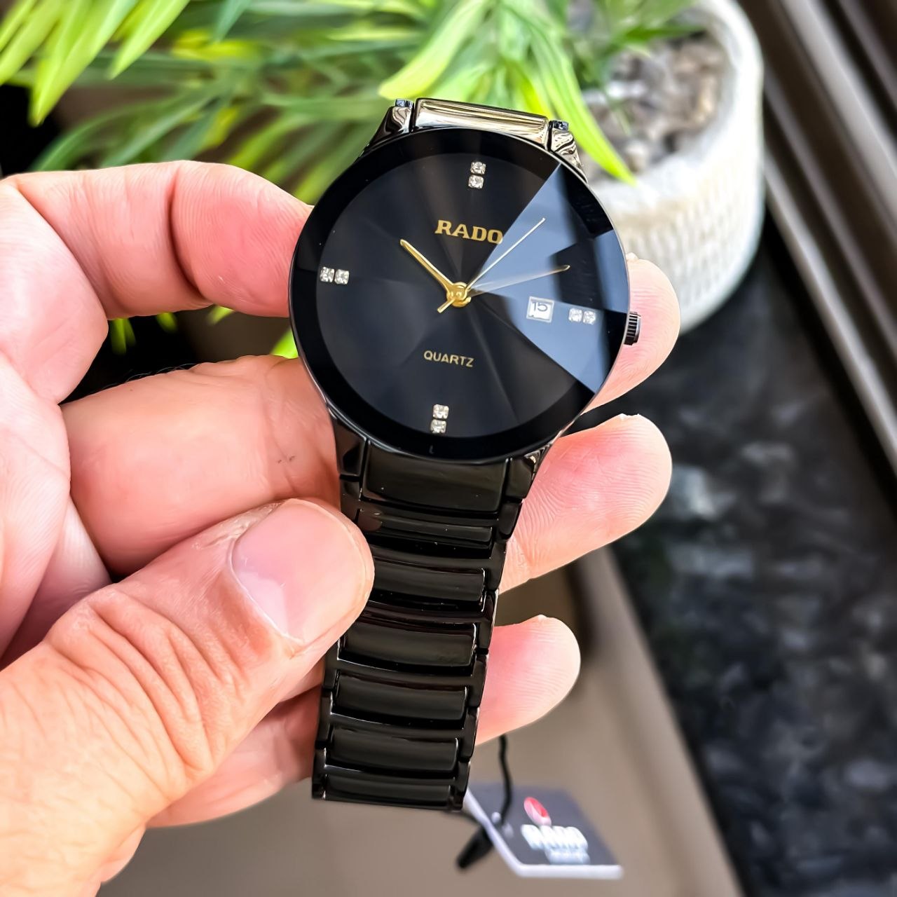 Rado True Round Thinline Men’s Watch featuring a mother-of-pearl inspired dial, diamond-cut glass, ceramic-inspired finish, slim profile, and reliable quartz movement. Rado True Round Thinline men's watch featuring a mother-of-pearl inspired double-layer dial, diamond-cut glass, ceramic-inspired finish, slim case design, and elegant luxury styling.