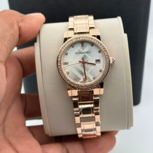 Burberry women's watch featuring an elegant dial design, working date display, quartz movement, and sophisticated luxury-inspired styling for everyday wear.