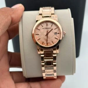 Burberry women's watch featuring an elegant dial design, working date display, quartz movement, and sophisticated luxury-inspired styling for everyday wear.