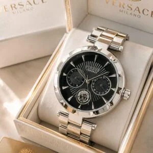 Versus by Versace Women's Chronograph Watch featuring a black sunray dial, working chronograph counters, day and date display, signature branding, Medusa emblem, and luxury-inspired styling.
